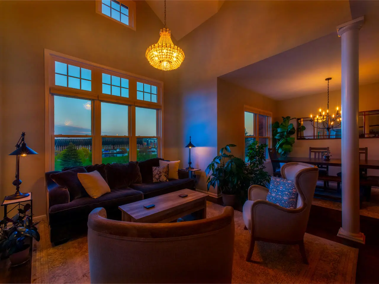 Luxury living room with chandelier and Lake Superior view