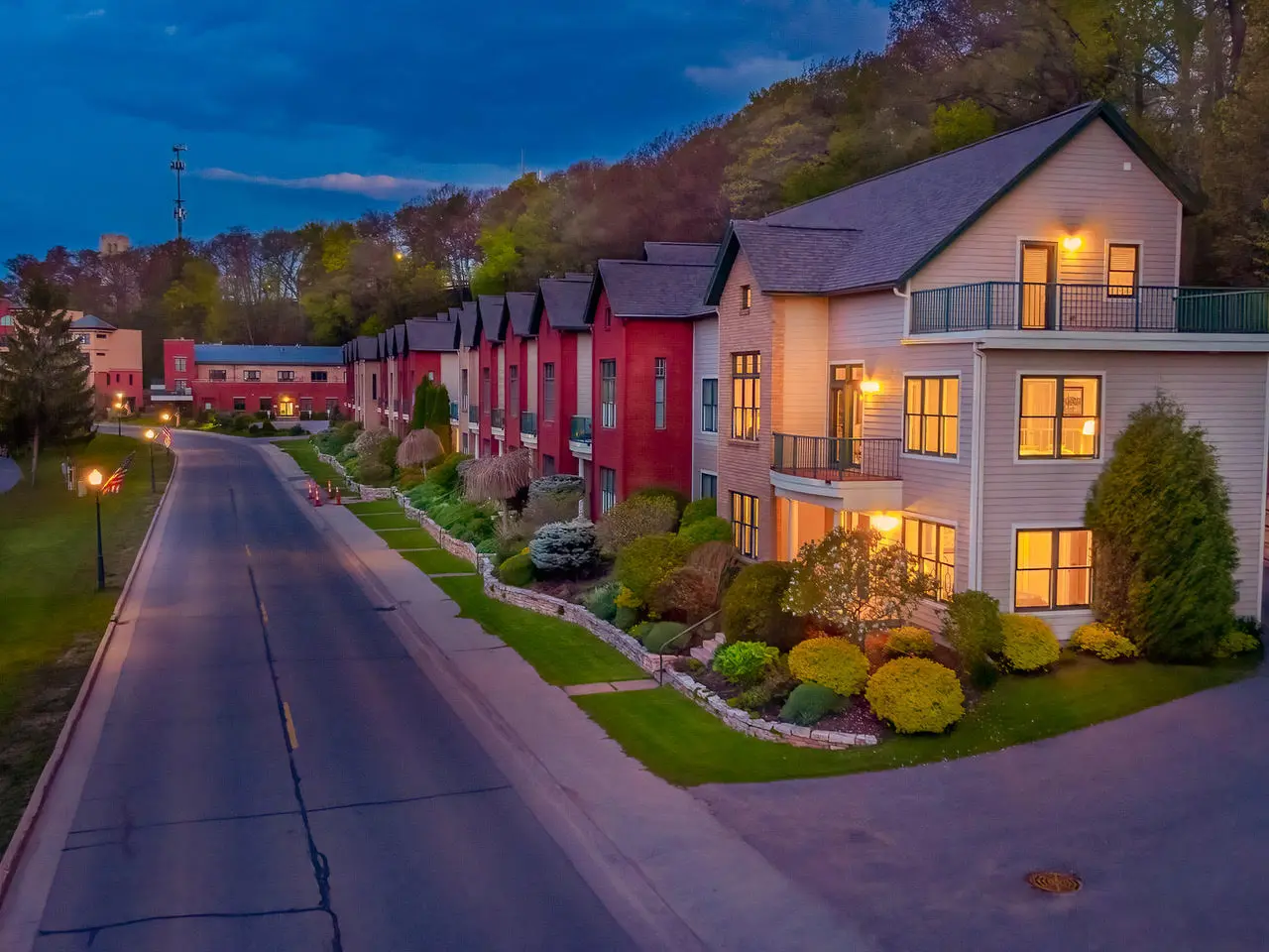 Beautiful homes along a street at twilight in Marquette